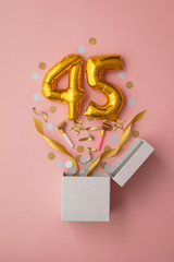 Number 45 birthday balloon celebration gift box lay flat explosion - obrazy, fototapety, plakaty