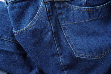 Naklejka premium Jeans background. Denim jeans texture. Blue denim pattern.