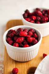  Candied cranberries, dried cranberries close-up. The right snack, sweets for vegetarians.