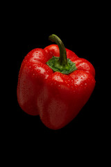 red pepper on a black background
