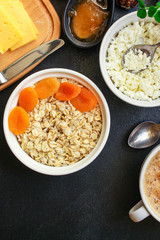 breakfast (cottage cheese, dairy products, dried fruits and more, snack) menu concept. background....