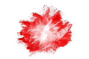 Freeze motion of red powder exploding, isolated on white background. Abstract design of red dust cloud. Particles explosion screen saver, wallpaper