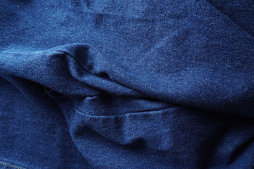 Jeans background. Denim jeans texture. Blue denim pattern.