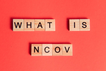 what is coronavirus word written on color background. what is coronavirus text on backdrop for your design, coronavirus concept top view.