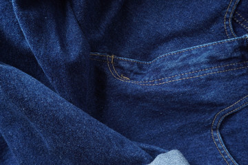 Jeans background. Denim jeans texture. Blue denim pattern.