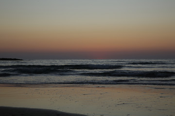 Fototapeta na wymiar beautiful sunset or sunrise on the beach. Sea background
