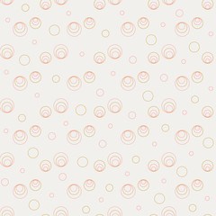 Seamless pattern of circles on a cream background
