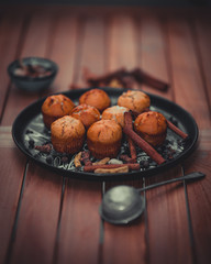 Cupcakes and tea prepared by women's labor.