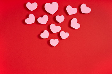 Valentine hearts on red surface. Top view, flat lay, from above, copy space