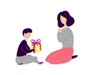 Little son giving gift to mother