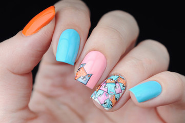 Bright manicure with pattern cat orange blue pink