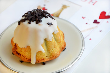 mini cupcake on a plate on a white background 