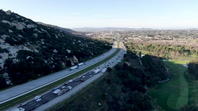 Aerial view of Temecula Valley freeway during sunny day. California highway, USA. 