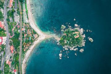 Aerial Drone view of Isola Bella, Taormina, Sicily. Splendid Island in the Mediterranean Coast