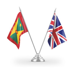 United Kingdom and Grenada table flags isolated on white 3D rendering