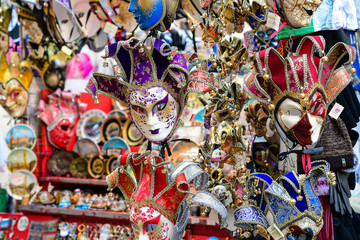 Carnival in Venice Italy. Traditional venetian carnival masks in the Italian market for tourists. trip to Italy, carnival 2020. selective focus.