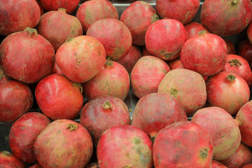 Pile of fresh and red Pomegranate.