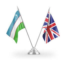 United Kingdom and Uzbekistan table flags isolated on white 3D rendering
