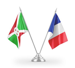 France and Burundi table flags isolated on white 3D rendering