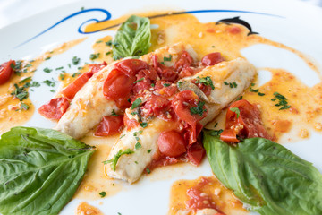Cod with tomato and basil