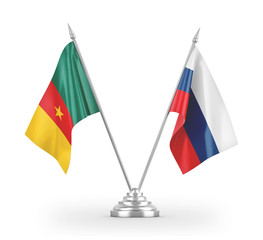 Russia and Cameroon table flags isolated on white 3D rendering