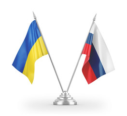 Russia and Ukraine table flags isolated on white 3D rendering