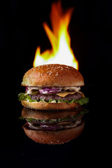  burger with fire on a black background for the site1