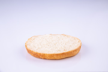  phased assembly of a hamburger on a light background10