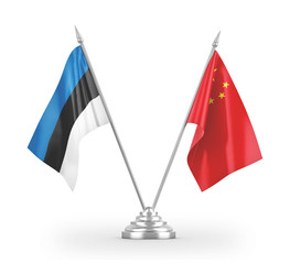 China and Estonia table flags isolated on white 3D rendering