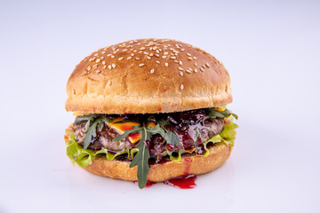 hamburger with cherry sauce on a light background for the menu1
