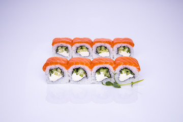 salmon rolls on a light background for the restaurant menu