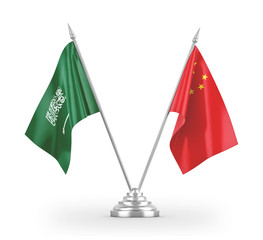 China and Saudi Arabia table flags isolated on white 3D rendering