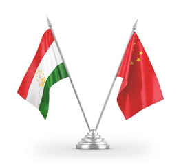 China and Tajikistan table flags isolated on white 3D rendering