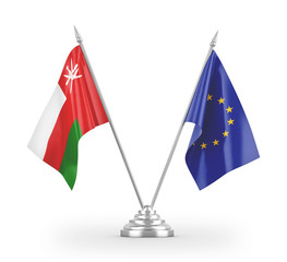 European Union and Oman table flags isolated on white 3D rendering