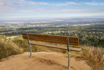 A bench overlooks the San Gabriel Valley near Los Angeles, California