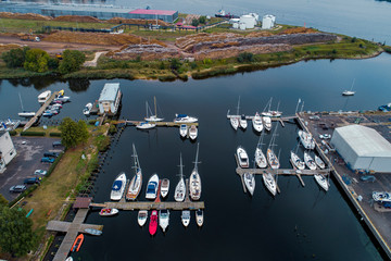 Fototapeta na wymiar Aerial View of multiple yachts and boats in the dock