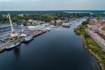 Obraz premium Aerial View of multiple yachts and boats in the dock