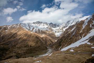 Overcast in mountains. Beautiful mountain rocks in clouds. Landscape of the North Caucasus