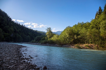 The mountain river in the picturesque gorge. Landscape of the North Caucasus