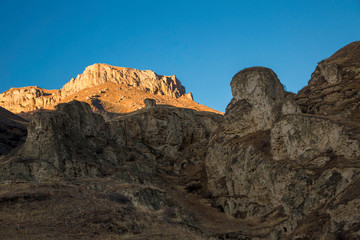 Fototapeta na wymiar Mountain rocks. The beautiful gorge with high rocks. Nature of the North Caucasus