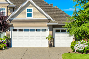 Fragment of a luxury house with a garage door in Vancouver, Canada.