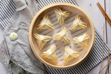 Dumplings and cooking in Chinese breakfast steamer