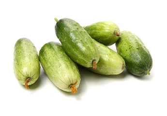 Green cucumber on the white background