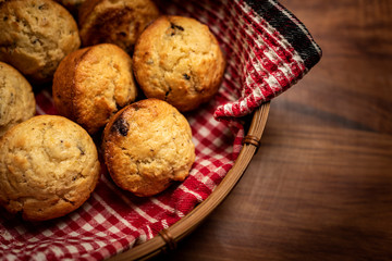 Freshly baked muffins in a basket