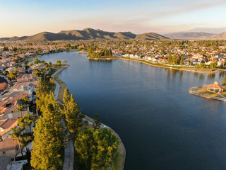 Aerial view of Menifee Lake and neighborhood, residential subdivision vila during sunset. Riverside...