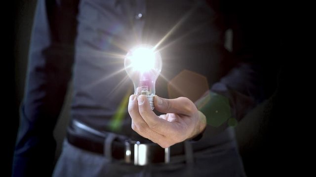 Business man turn on light bulb V2
4K UHD