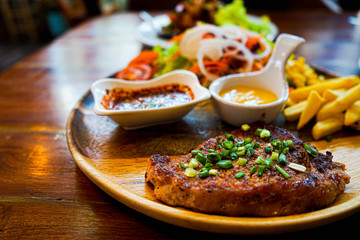 beautiful steak with salad and Mayonnaise and chili