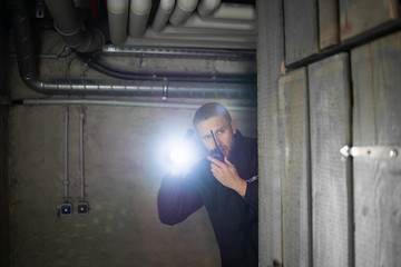 Security Guard Standing In The Basement