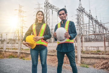 Engineer holding white helmet safety hard hat copy spec