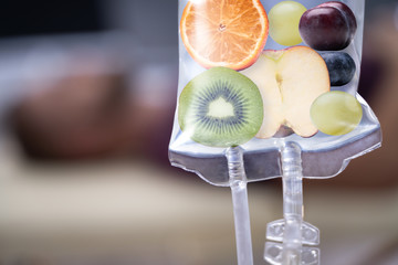 Fruit Slices Inside Saline Bag Hanging In Hospital